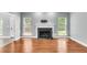 Bright living room with hardwood floors, fireplace, access to deck at 8166 Scottswood Dr, North Charleston, SC 29418