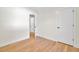 Bedroom featuring hardwood floors and an open door leading to another room at 8612 Delhi Rd, North Charleston, SC 29406