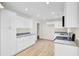 Modern kitchen featuring white cabinets, stainless steel appliances, and granite countertops at 8612 Delhi Rd, North Charleston, SC 29406