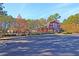 Community center with a playground and a parking lot in a well-maintained, landscaped setting at 8965 N Red Maple Cir, Summerville, SC 29485