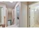 Hallway showcasing access to different rooms and levels, offering an efficient use of space at 8965 N Red Maple Cir, Summerville, SC 29485
