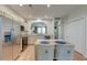 Modern kitchen with stainless steel appliances, granite countertops, and a breakfast bar at 8965 N Red Maple Cir, Summerville, SC 29485