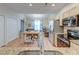 Open-concept kitchen with stainless steel appliances and a view to the breakfast area and living room at 8965 N Red Maple Cir, Summerville, SC 29485