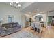 Open living space featuring a modern kitchen and a comfortable seating area at 8965 N Red Maple Cir, Summerville, SC 29485