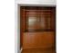 Built-in shelving with closed storage offers ample room for books and storage at 9 Wesley Dr, Charleston, SC 29407