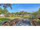 Backyard view featuring a new in-ground pool under construction and waterfront view of marshland at 932 N Shem Dr, Mount Pleasant, SC 29464