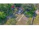 Overhead view of backyard with a patio area, firepit with seating, and a new pool being constructed at 932 N Shem Dr, Mount Pleasant, SC 29464