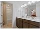 Bathroom featuring a double sink vanity, white countertops, and a combination bathtub and shower at 101 Caleb Ct, Ladson, SC 29456
