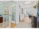 Bright foyer with hardwood floors leading to a study with French doors and an open-concept living area at 101 Caleb Ct, Ladson, SC 29456