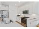 Beautiful kitchen features stainless steel appliances, white subway tile backsplash, and quartz countertops at 101 Caleb Ct, Ladson, SC 29456