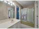 Bathroom with a white vanity, shower/tub combination, and tiled floors at 102 Ashborough Ave, Summerville, SC 29485