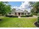 Charming brick home with well-manicured lawn and mature landscaping, offering great curb appeal at 102 Ashborough Ave, Summerville, SC 29485