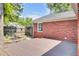 Backyard patio with a koi pond and a wooden deck along the house at 1027 E Recess Rd, Hanahan, SC 29410