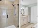 Updated bathroom featuring a glass shower and vanity with granite countertops at 1027 E Recess Rd, Hanahan, SC 29410