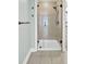 Bathroom with a shower featuring decorative tile and glass door at 1027 E Recess Rd, Hanahan, SC 29410