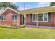Close up of entrance with brick facade and front porch at 1027 E Recess Rd, Hanahan, SC 29410