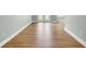 Close up of new luxury vinyl plank flooring and neutral wall paint at 1027 E Recess Rd, Hanahan, SC 29410