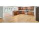 The kitchen and living area show stainless steel appliances, wood cabinets, and an open-concept layout at 1027 E Recess Rd, Hanahan, SC 29410