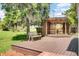 Wooden deck featuring a covered pergola and bench seating at 1027 E Recess Rd, Hanahan, SC 29410