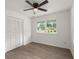 This bright bedroom features a large window, ceiling fan, closet and neutral flooring at 105 Bermuda Ct, Summerville, SC 29485