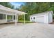 Home with a covered carport, large driveway, and detached garage at 105 Bermuda Ct, Summerville, SC 29485
