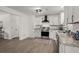 Bright kitchen featuring granite countertops, stainless steel appliances, and updated lighting at 105 Bermuda Ct, Summerville, SC 29485