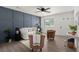 Stylish living room featuring a cozy seating arrangement and a dark accent wall, inviting relaxation at 105 Bermuda Ct, Summerville, SC 29485