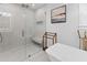 Bright bathroom showcasing a soaking tub, glass-enclosed shower, and tasteful decor at 1055 Royalist Rd, Mount Pleasant, SC 29464