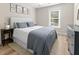 Comfortable bedroom featuring a bed, window and hardwood floors at 1055 Royalist Rd, Mount Pleasant, SC 29464