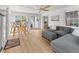 Open-concept living room featuring a hardwood floors and backyard access at 1055 Royalist Rd, Mount Pleasant, SC 29464