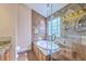 Luxurious bathroom featuring a soaking tub, glass shower, and beautiful tile work at 110 Salinas Ct, Summerville, SC 29483