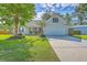 Charming single-Gathering home features a well-manicured lawn, a two-car garage, and beautiful landscaping at 110 Salinas Ct, Summerville, SC 29483