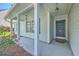 Charming front porch with a dark blue front door and decorative plants, adding to the home's curb appeal at 110 Salinas Ct, Summerville, SC 29483
