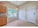 Bright kitchen nook featuring tile floor, natural light, and direct access to the back yard at 110 Salinas Ct, Summerville, SC 29483