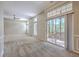 Bright and airy living room with high ceilings, large windows, and easy access to the outdoor deck at 110 Salinas Ct, Summerville, SC 29483