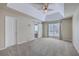 Serene bedroom with tray ceiling, neutral color palette, ceiling fan, and plush carpeting at 110 Salinas Ct, Summerville, SC 29483