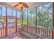 Inviting screened-in porch with wicker furniture and scenic backyard views at 110 Salinas Ct, Summerville, SC 29483