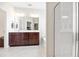 Bathroom featuring a double vanity, soaking tub, and glass-enclosed shower for a spa-like experience at 111 Gavins Way, Goose Creek, SC 29445