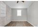 A bright room with hard wood floors, a white brick wall and inset shelving at 113 Owens Cir, Summerville, SC 29483
