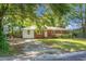 Charming brick and siding home with well-maintained lawn and mature trees, nestled on a quiet street at 113 Owens Cir, Summerville, SC 29483