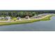 Aerial view of the home's location near a lake and surrounded by trees at 1132 Wading Point Blvd, Huger, SC 29450