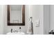 Modern bathroom with a stylish mirror, faucet, and towel at 1132 Wading Point Blvd, Huger, SC 29450