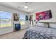 Spacious bedroom with views of the lake, decor, and ample natural light at 1132 Wading Point Blvd, Huger, SC 29450