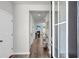 Inviting foyer featuring dark wood floors that transition seamlessly into the open living space at 1132 Wading Point Blvd, Huger, SC 29450