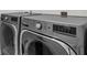 Laundry area with gray washer and dryer units at 1132 Wading Point Blvd, Huger, SC 29450