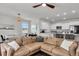 Open living space blending kitchen, dining, and living areas with large sectional couch at 1132 Wading Point Blvd, Huger, SC 29450