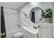 Bathroom featuring a vanity, shower, and flowers at 116 Cone Ln, Summerville, SC 29483