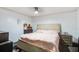 Cozy bedroom featuring a comfortable bed, side tables, and carpet flooring at 116 Cone Ln, Summerville, SC 29483