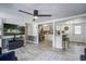 Stylish living room featuring a ceiling fan, wood floors, and an open view to the kitchen at 116 Cone Ln, Summerville, SC 29483