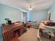 Bedroom with a bed, desk, ceiling fan, and window at 120 Larkspur Dr, Goose Creek, SC 29445